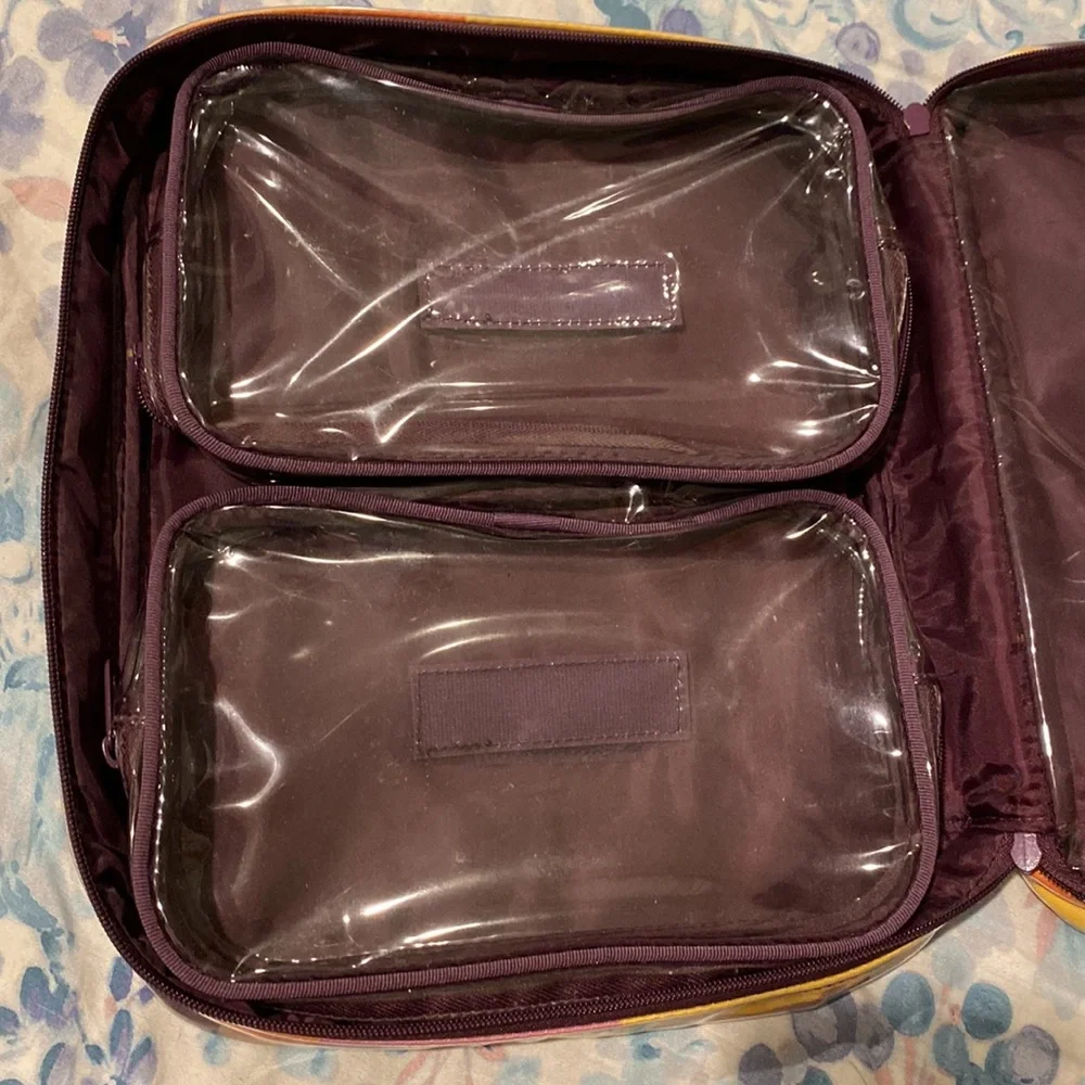Victoria’s Secret travel case with removable pouches.
